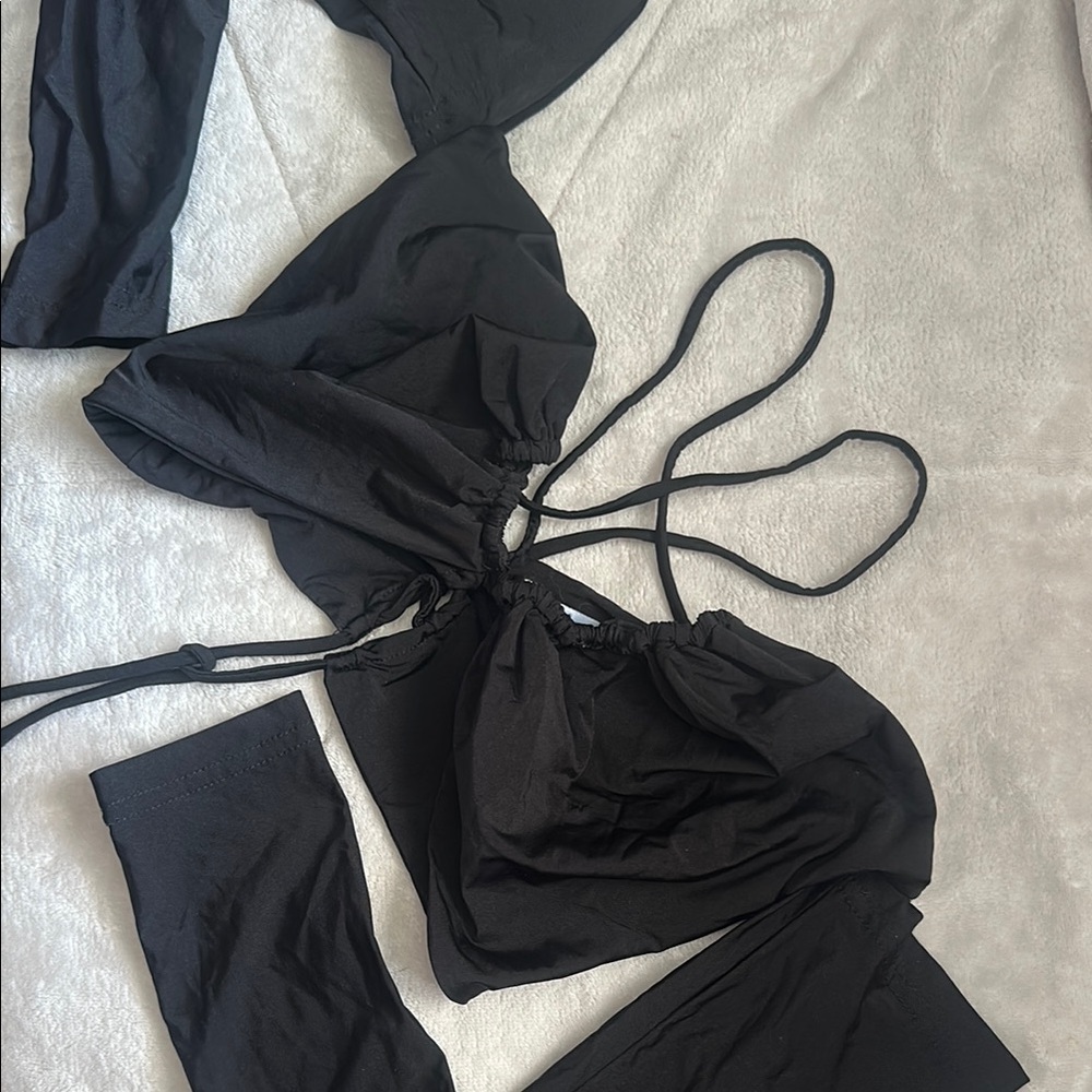Black Criss Cross Sold Out Sleeve Top